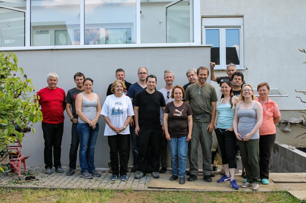 Group photograph of workshop participants outside the building