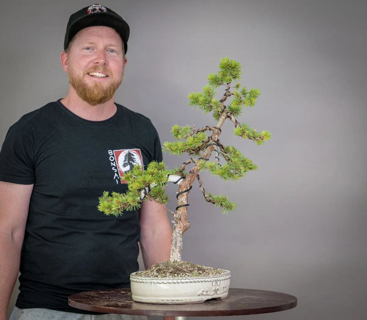 At the Bonsai Kreativ workshop with Václav Stropek: Workshop work on a pine in an upright form, with wired branches.